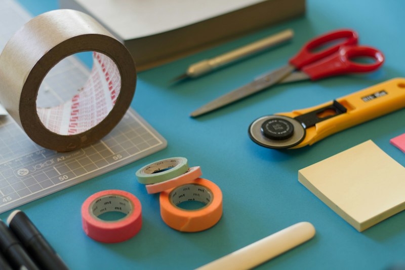 Craft table with yarn and paper